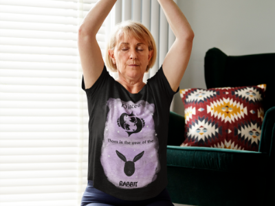 Woman sitting on floor doing yoga