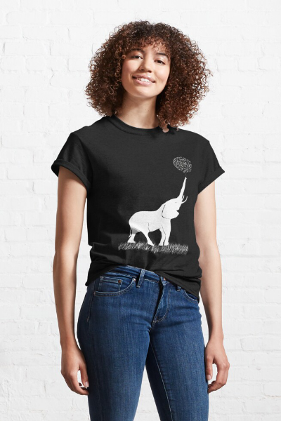 white elephant holding dandelion